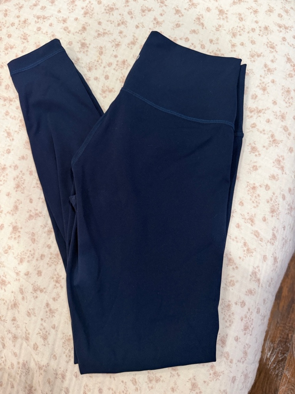 lululemon athletica black top with gold logo